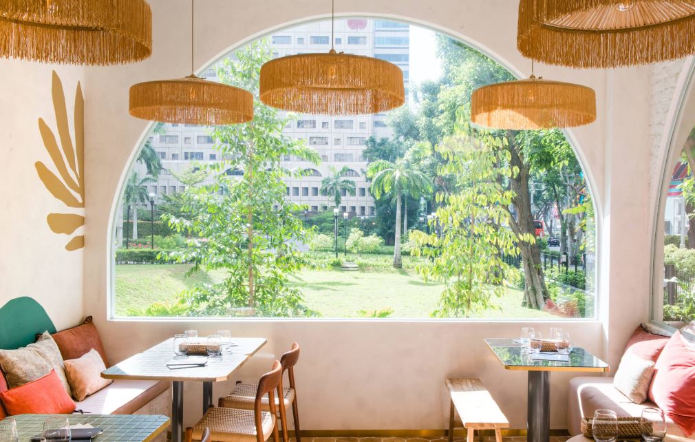 Enjoy French cuisine in a tropics setting at Merci Marcel